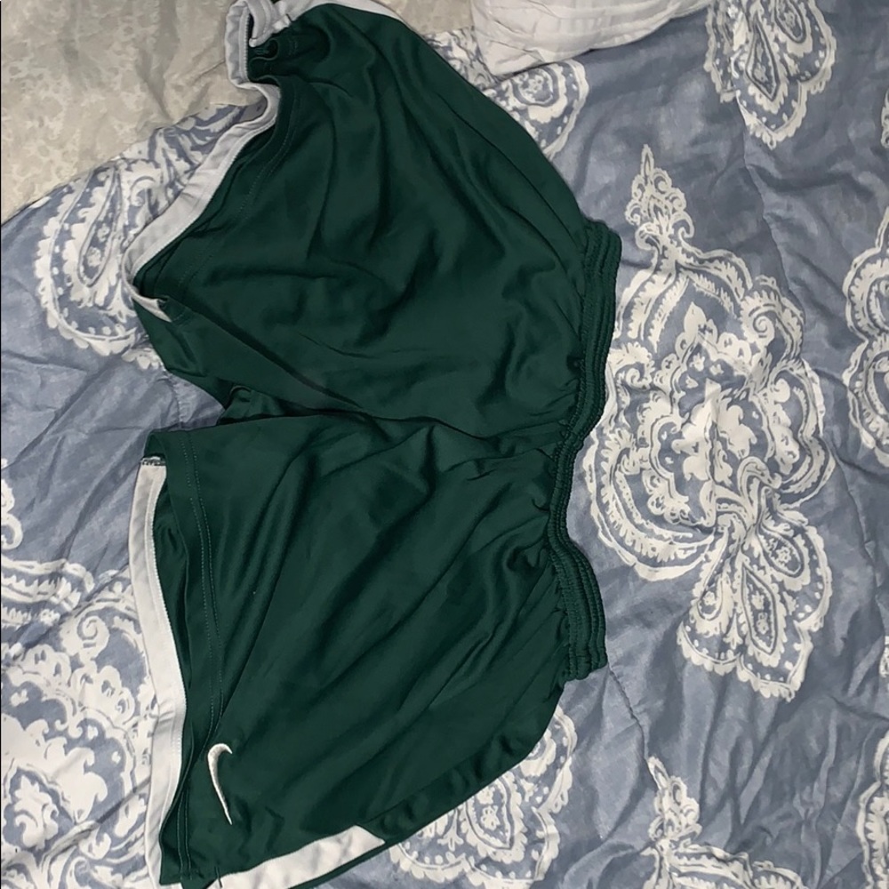 Green Nike shorts